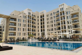 Lovely calm 3BR Apartment With Pool view in Town square Nshama